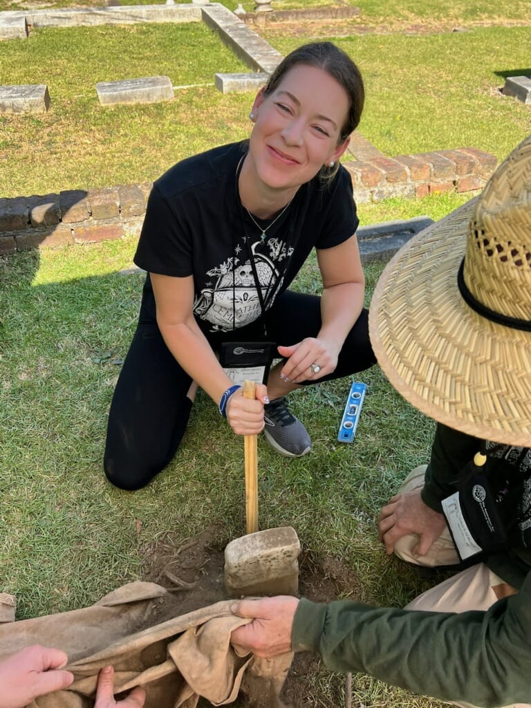 Jillian Glantz helping with gravestone restoration in Atlanta, Georgia, at the annual conference for the Association of Gravestone Studies