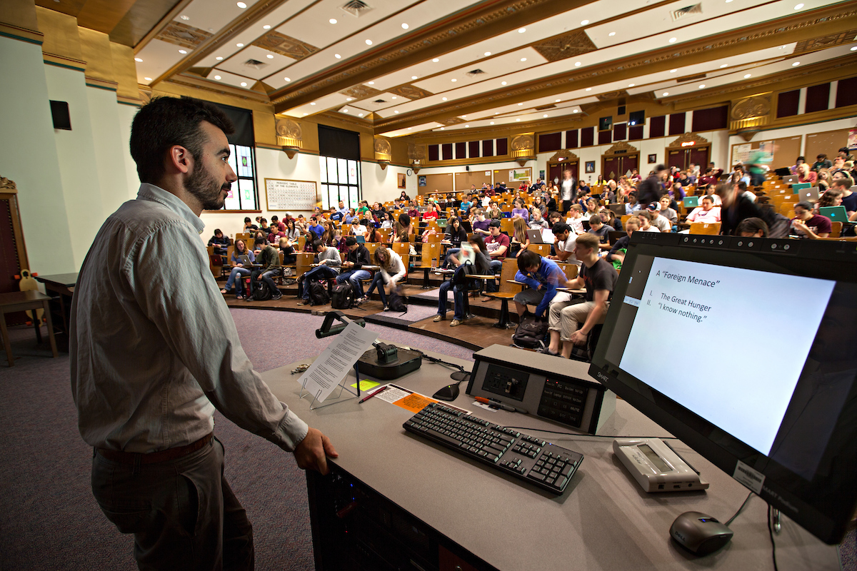 History Professor Brian Rouleau teaches in a lecture hall full of students at Texas A&M University.