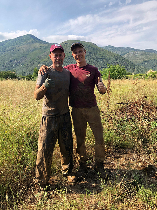 Tristan Krause at an excavation of a B-26 crash in mainland Italy. Pictured also is Dan Debree, a US Air Force veteran and professor of practice at the Bush school. This excavation was led by the Cranfield Recovery and Identification of Conflict Casualties team in partnership with the U.S. Department of Defense POW/MIA Accounting Agency.
