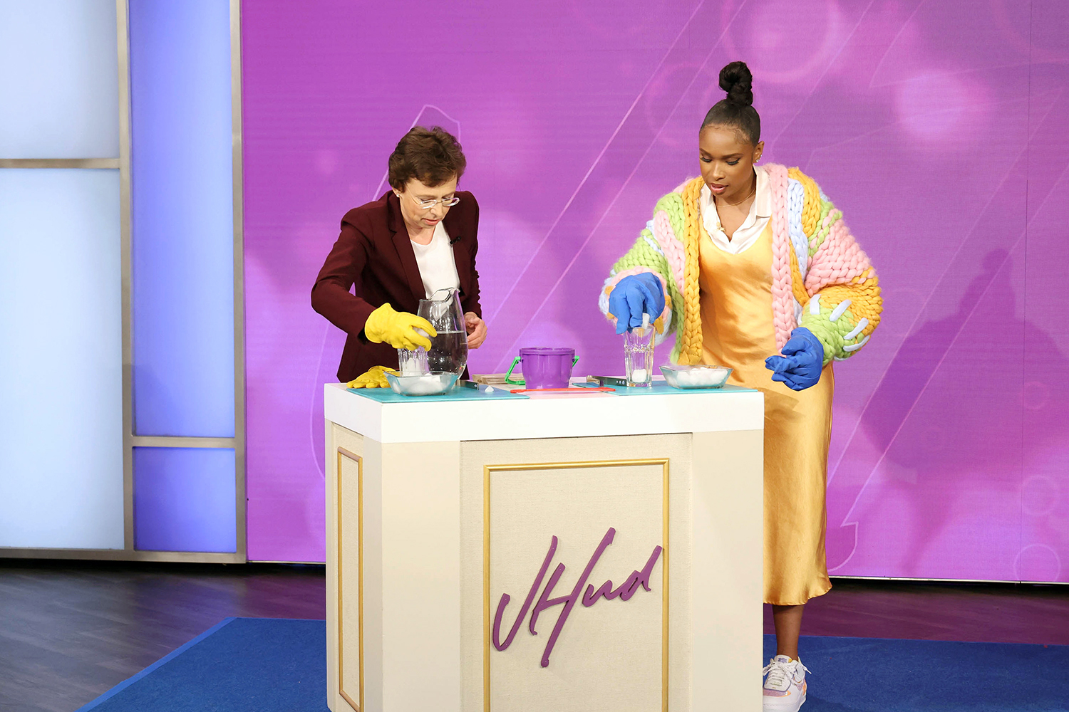Texas A&M physicist Tatiana Erukhimova and Jennifer Hudson drop chunks of dry ice into water while on set at The Jennifer Hudson Show