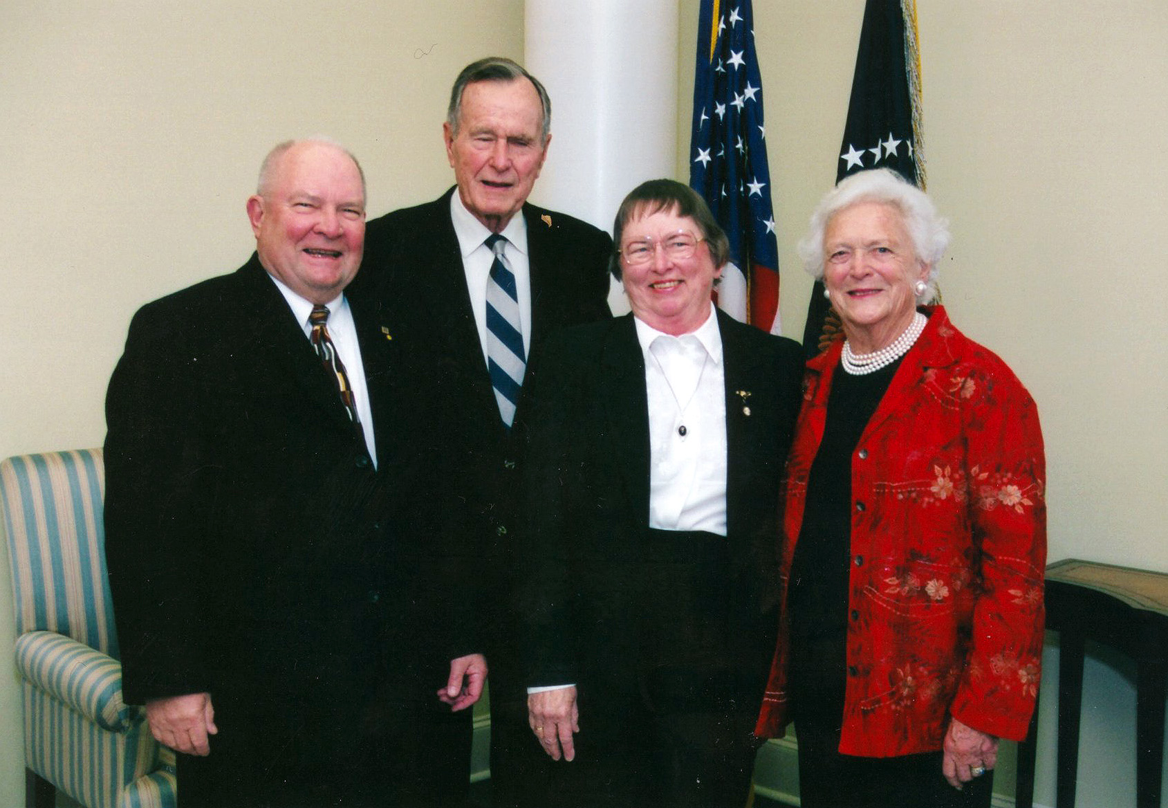 Texas A&M chemist John Fackler and his wife Naomi pose with George and Barbara Bush at the November 6, 1997, dedication of his presidential library on the Texas A&M University campus