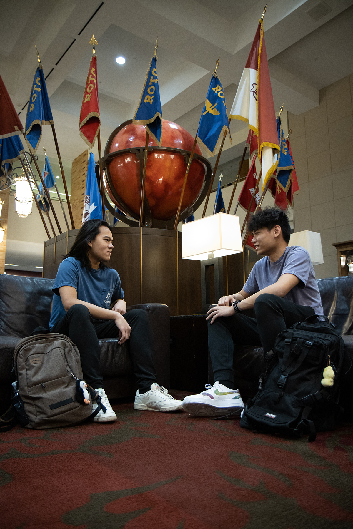 Texas A&M biology majors and brothers Henry and Kyle Nguyen in the Memorial Student Center flagroom on the Texas A&M campus