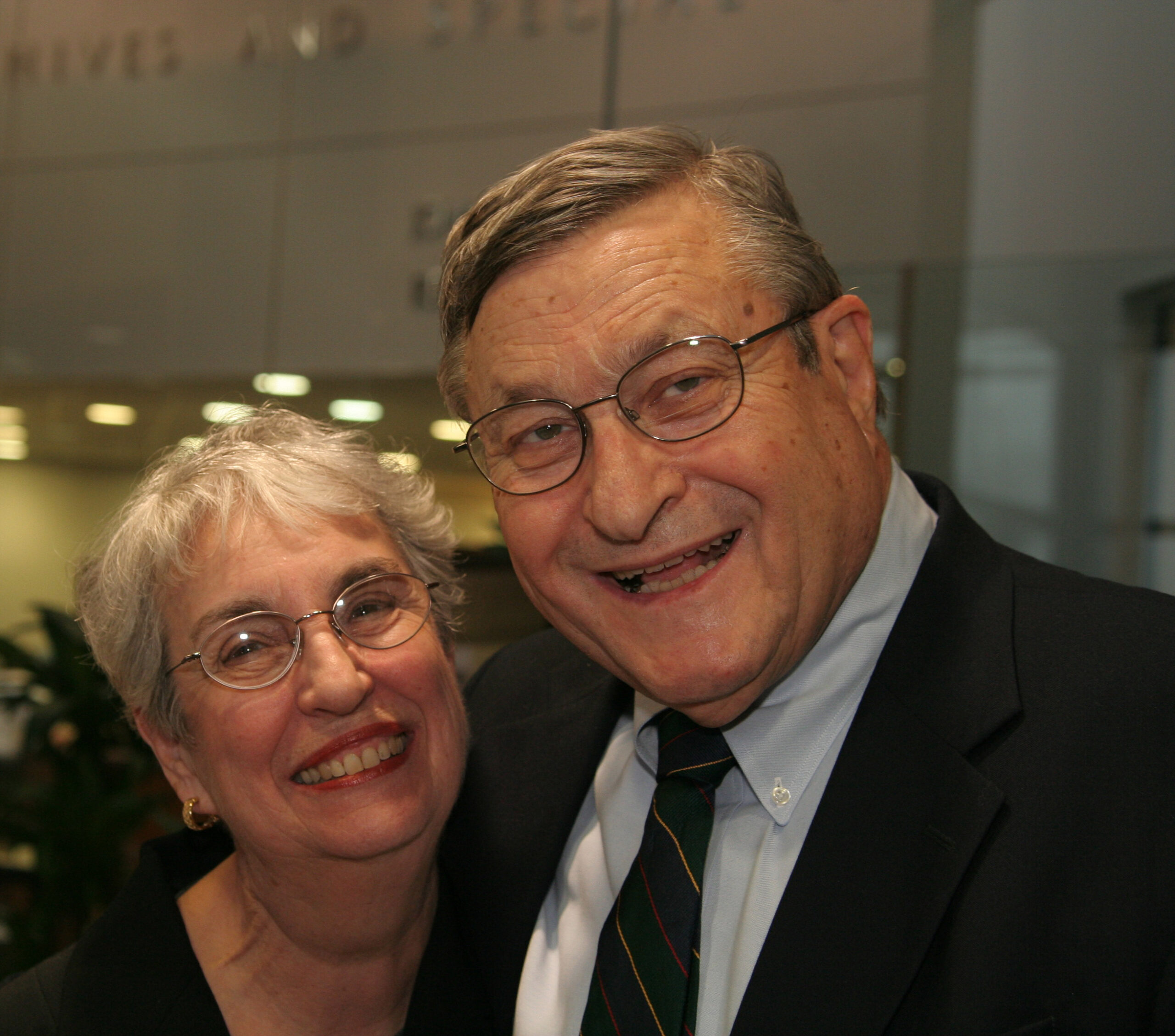 Carol and Emanuel Parzen smile for the camera at an event held in his honor at Texas A&M University