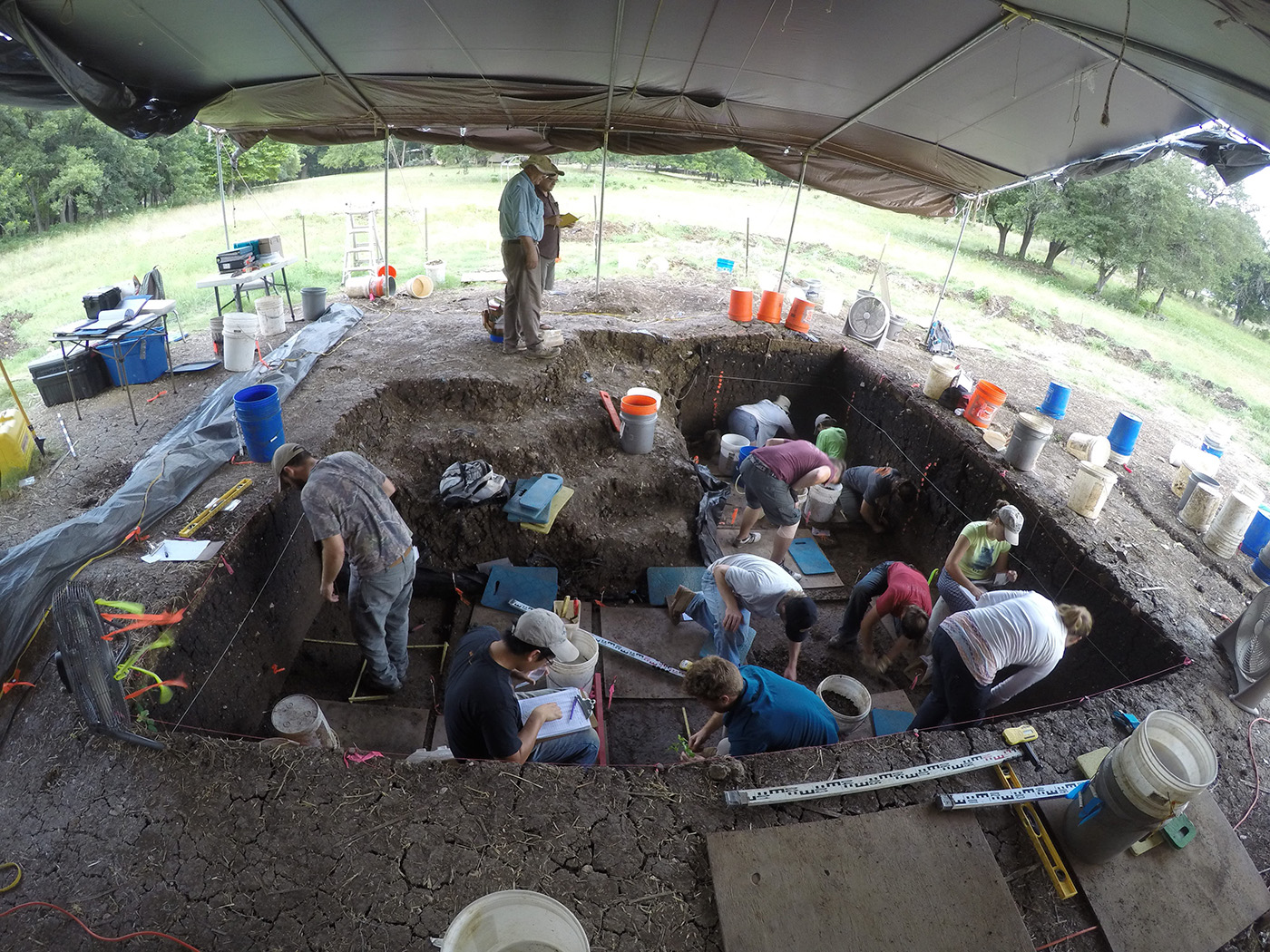 Texas A&M archaeologist Michael Waters and Texas A&M students work a dig at the Debra L. Friedkin site in central Texas