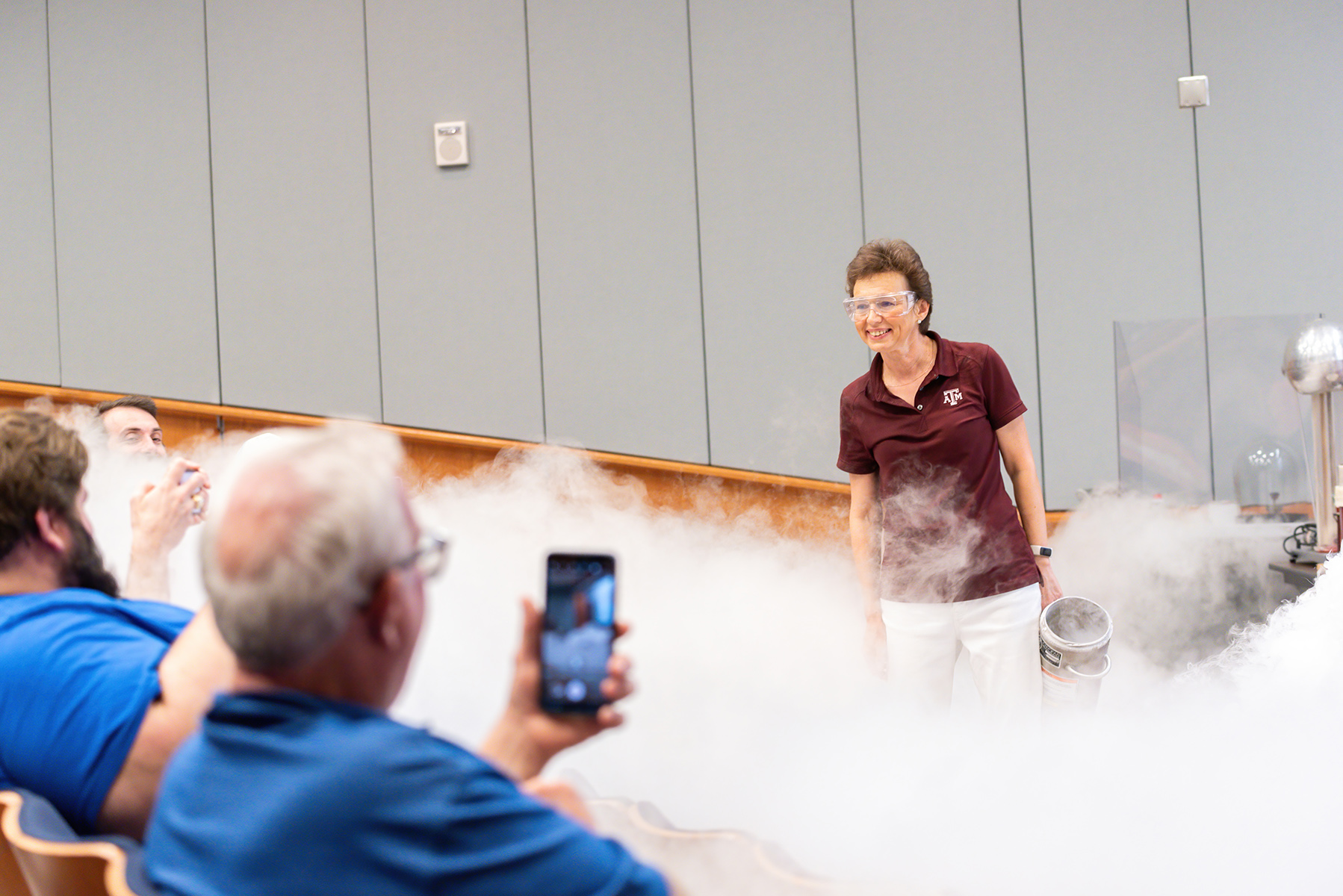 Texas A&M physicist Tatiana Erukhimova performs a liquid nitrogen-related experiment at the Mitchell Institute Physics Enhancement Program for high school physics teachers