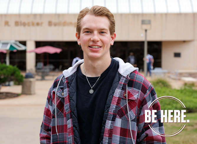 Texas A&M University statistics major Drew Kearny poses in front of the John R. Blocker Building on the Texas A&M campus