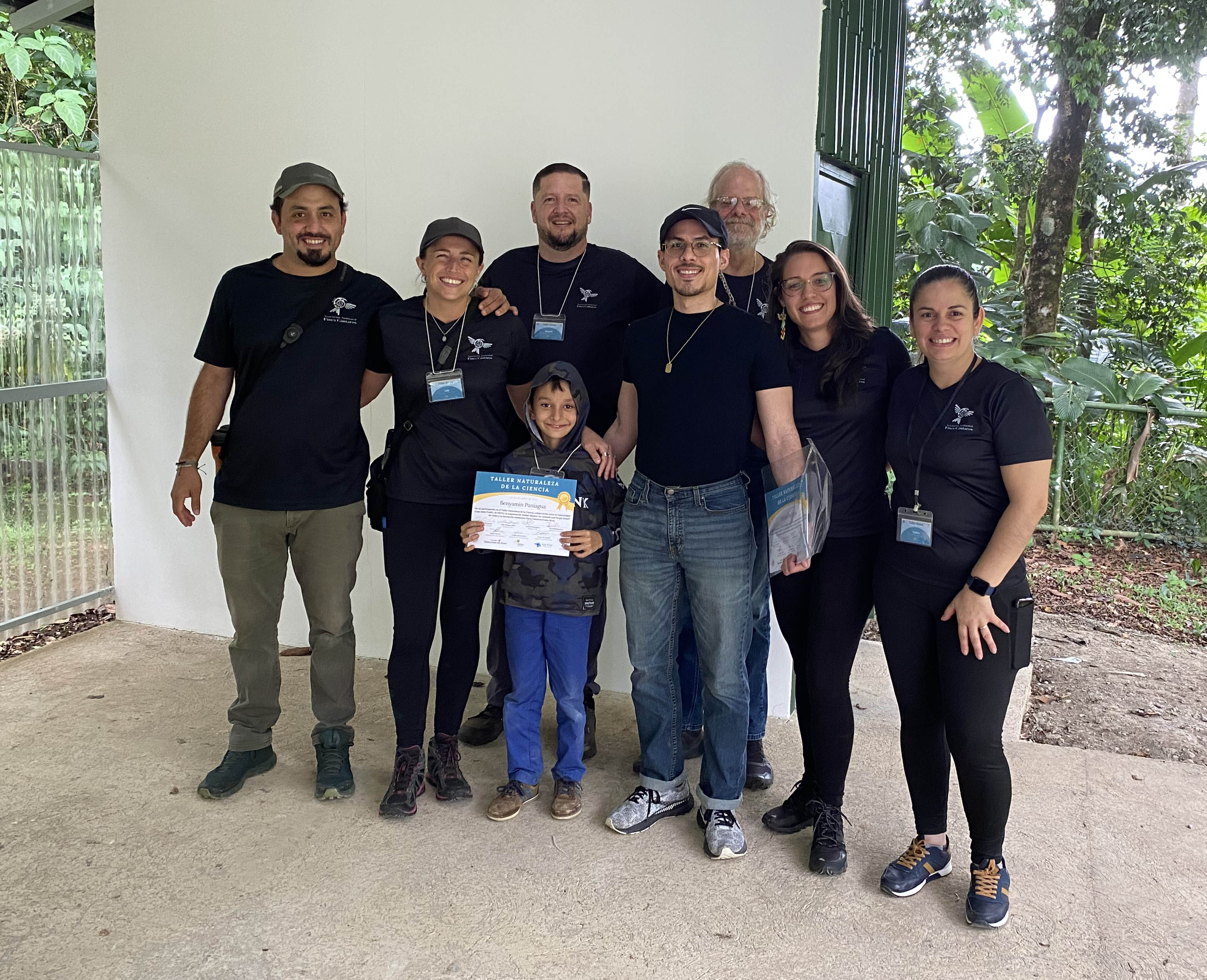 Texas A&M University doctoral student Daniel De Jesús (center in blue jeans) poses with a group of Finca Cántaros Environmental Association staff during his 2023 visit to Costa Rica