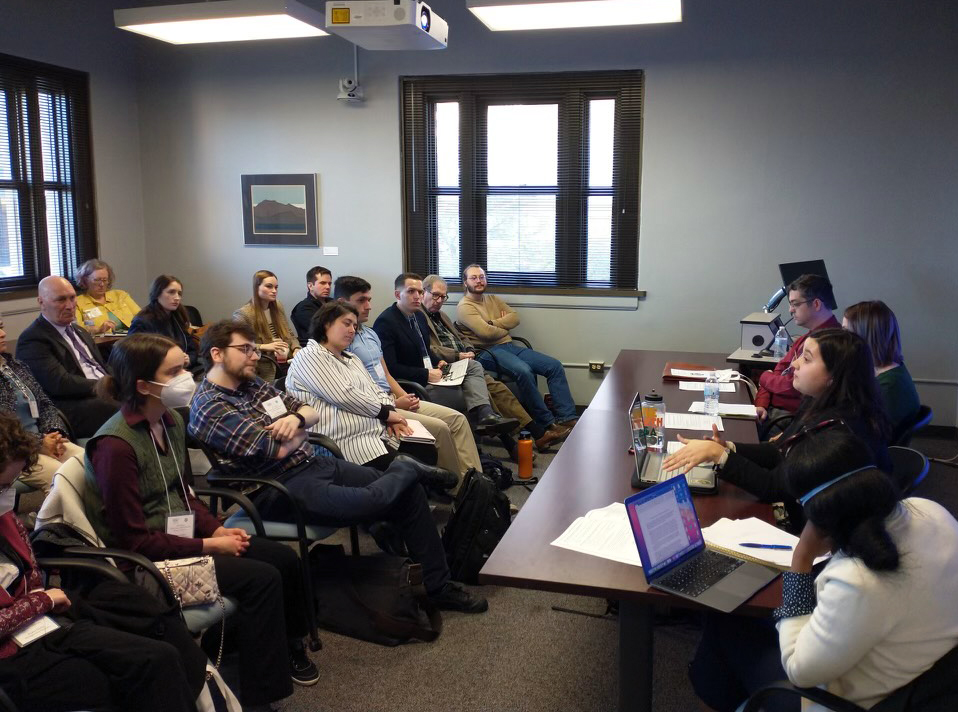 A panel presents to 2023 History Graduate Student Organization 13th Annual Conference attendees within the Glasscock Building at Texas A&M University
