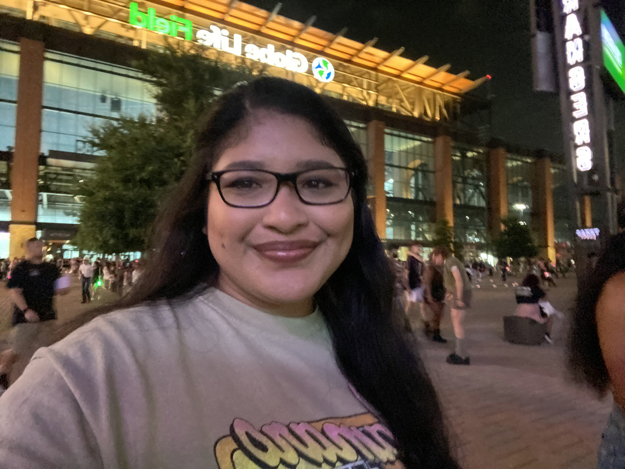 Texas A&M University sociology major Vaneza Palma Barron takes a selfie outside Global Life Field in Arlington, Texas