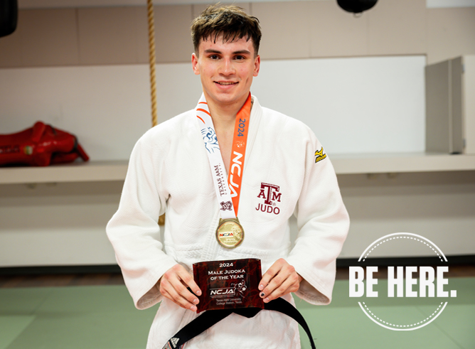 Texas A&M University applied mathematics major Paolo Maaskant poses in his judo robe with his first-place plaque
