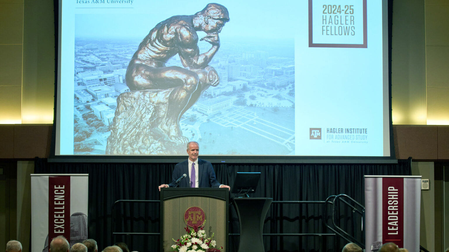 Texas A&M University Provost Alan Sams addresses the crowd at a September 23, 2024, reception for the 2024-25 Hagler Fellows on the Texas A&M campus