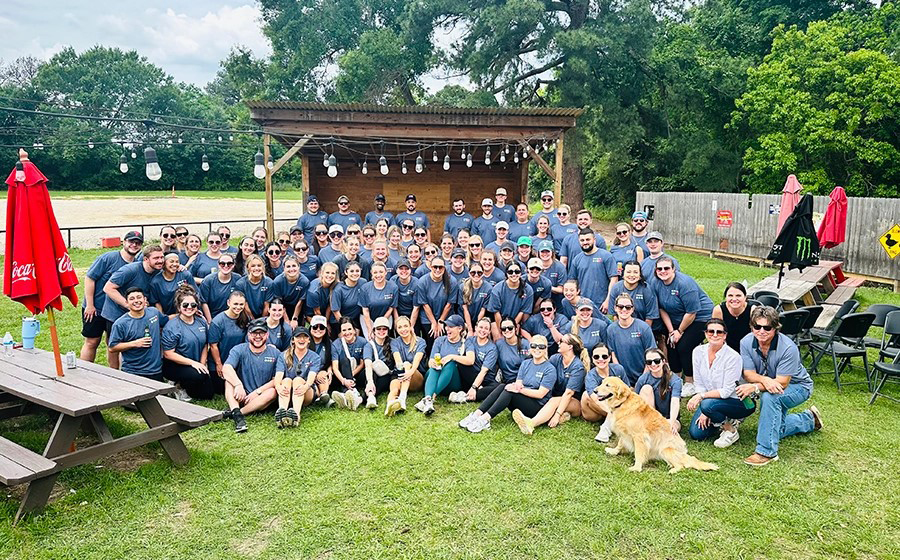 Group photograph of 2020 Texas A&M University economics graduate Noelle Levantino's former coworkers at Insight Global gathered for their annual Field Day in her honor