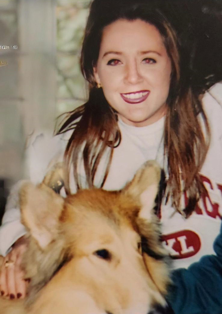 1990 Texas A&M University Susan Smallman, posing with Reveille during her undergraduate days in Aggieland